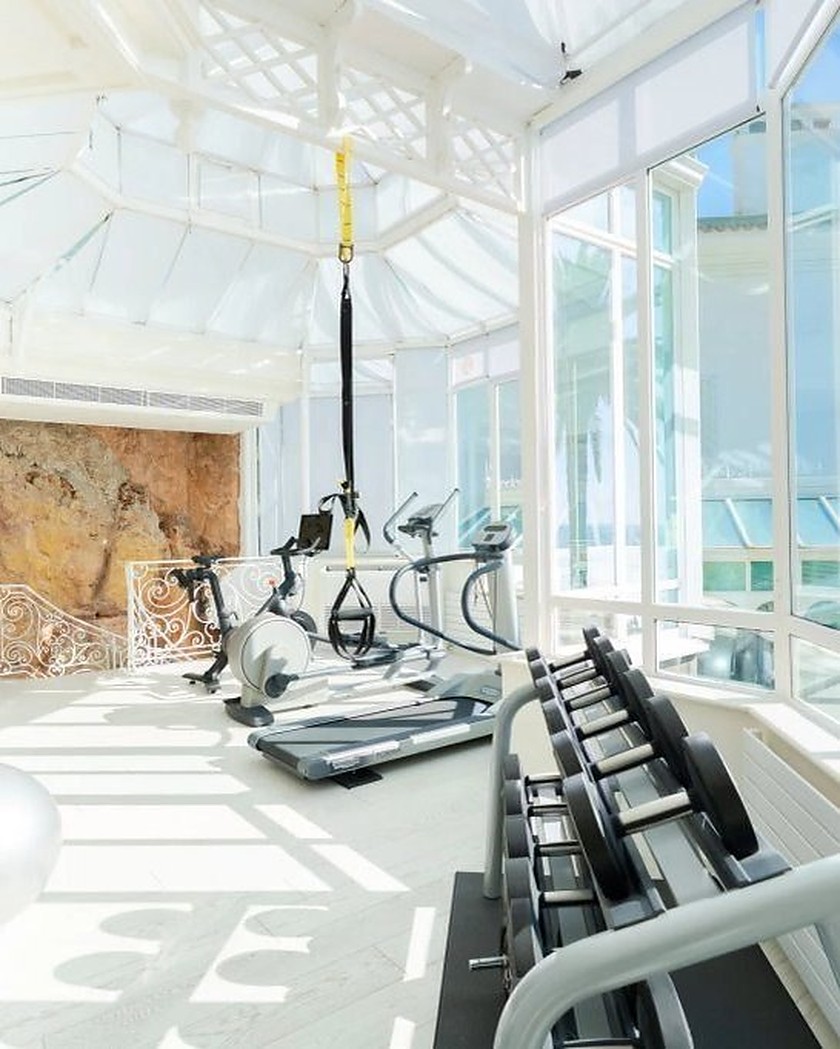 The glass-roofed gym of the villa.
